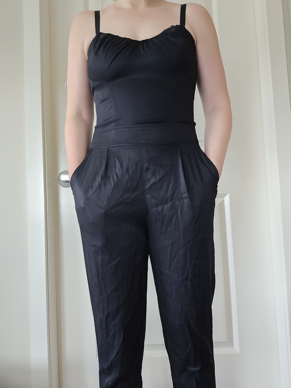 bebe Black Sleeveless Jumpsuit with Pockets